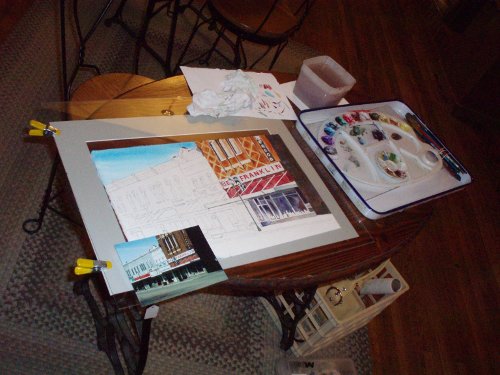 Work table with painting in progress.